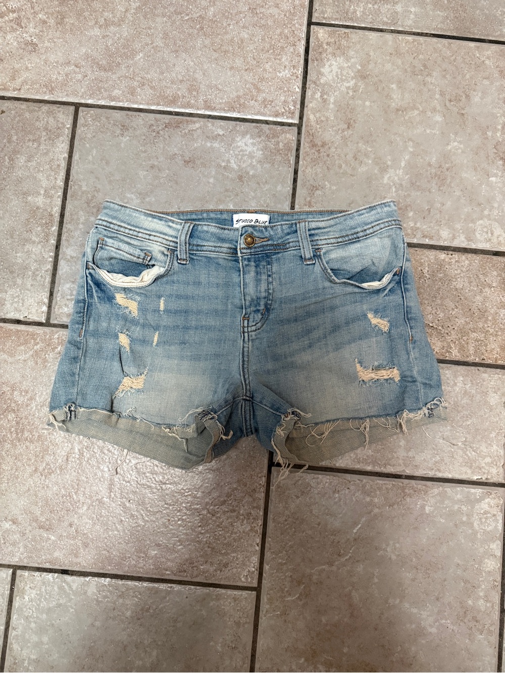 Studio Blue size 29 distressed jean shorts